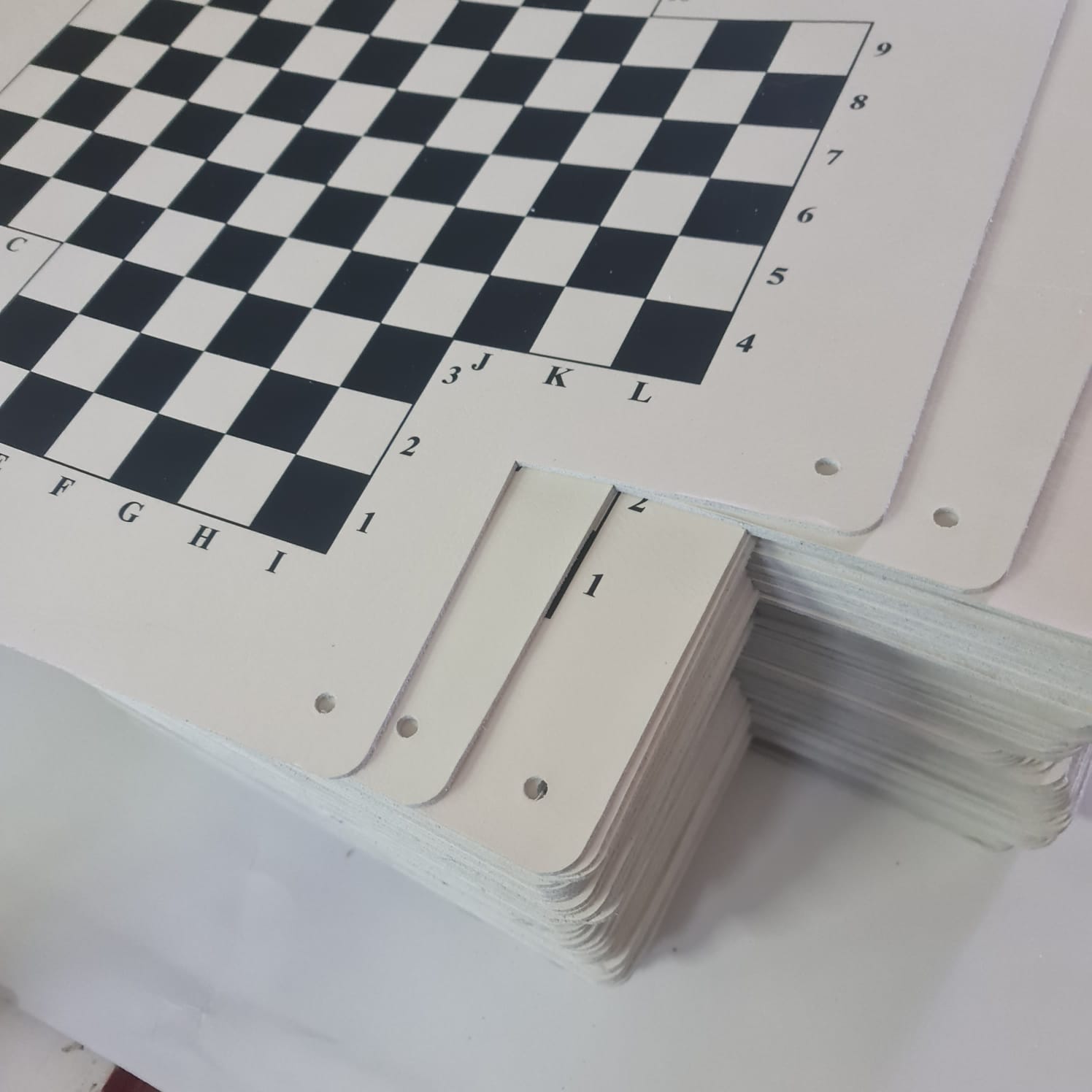 Stacked leather FRONTIERS boards from the production run.
